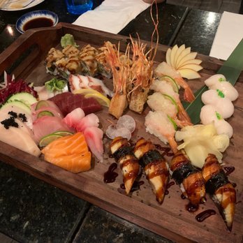 Utamaro Sushi Bar - Sashimi Combo, unagi nigiri, Scallops nigiri, Sweet Shrimp nigiri, and Dragon Roll - Sushi Bars Near Me - Sarasota, Florida Utamaro Sushi Bar - Sashimi Combo, unagi nigiri, Scallops nigiri, Sweet Shrimp nigiri, and Dragon Roll - Sushi Bars Near Me - Sarasota, Florida