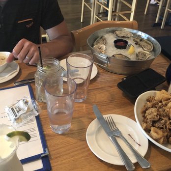 Surf City Bistro - Piña colada, fried calamari, oysters and New England claws chowder. - American Near Me - Surf City, New Jersey Surf City Bistro - Piña colada, fried calamari, oysters and New England claws chowder. - American Near Me - Surf City, New Jersey