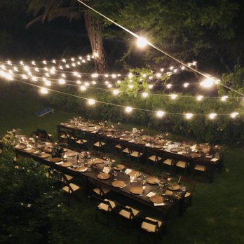 Big Island Tents - May 17, 2018 Wedding - 6x 42"x96" Dark Wood Farm Tables with Dark Wood Padded Folding Chairs + Cafe Lighting on lower lawn - Party Supplies Near Me - Waimea, Hawaii