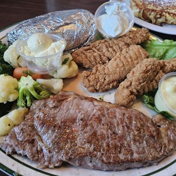 NORMS Restaurant - NY steak and chicken strips with veggies and a baked potato - Breakfast & Brunch Near Me - Pico Rivera, California NORMS Restaurant - NY steak and chicken strips with veggies and a baked potato - Breakfast & Brunch Near Me - Pico Rivera, California