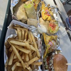 Sleepy Hollow Fish Camp - Grilled chicken Caesar wrap Grilled chicken BLT wrap Black Angus mushroom and Swiss burger