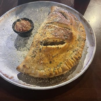 That's Amore Pizzeria - Mushroom 1-Topping Calzone - Italian Near Me - Metairie, Louisiana That's Amore Pizzeria - Mushroom 1-Topping Calzone - Italian Near Me - Metairie, Louisiana