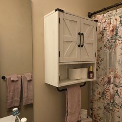 Amine's Handyman Services - Cabinet installation, and towel holders installations.