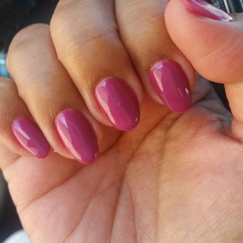 Apple Nail Salon - Rounded nails and they're not even. My other hand looks way different than this one! - Nail Salons Near Me - Cerritos, California