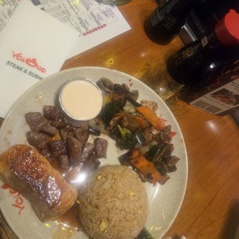 Volcano Steak & Sushi - Salmon,  steak,  fried rice,  and veggies with a side of yum yum sauce - Sushi Bars Near Me - Kennesaw, Georgia