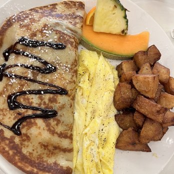 Universel Déjeuners et Grillades - 2 Crêpe (Banana and Strawberry w/ Chocolate) and Egg Combo - Breakfast & Brunch Near Me - Montreal, Quebec Universel Déjeuners et Grillades - 2 Crêpe (Banana and Strawberry w/ Chocolate) and Egg Combo - Breakfast & Brunch Near Me - Montreal, Quebec
