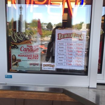 BeaverTails - a sign in a window of a restaurant - Desserts Near Me - Tobermory, Ontario