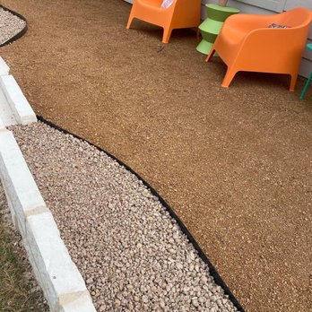 Mr Tibbs Landscaping - a gravel patio with chairs - Lawn Services Near Me