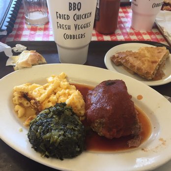 Matthews Cafeteria - The food is served in heaping portions, such as this meatloaf topped with sauce. - Southern Near Me - Tucker, Georgia Matthews Cafeteria - The food is served in heaping portions, such as this meatloaf topped with sauce. - Southern Near Me - Tucker, Georgia