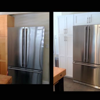 Hollywood Refinishing - New cabinet above the refrigerator and a panel installed to affect a built in look. - General Contractors Near Me - North Hollywood, California