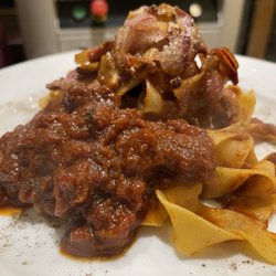 Maurizio Dining & Co. - Guanciale(crispy pig's cheeks) in Maurizio's homemade tomato sauce - five ingredients that cook for five hours - served with pasta