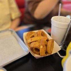 Edmond's Burgers & More - Onion rings. The outside was cooked perfectly, but I wish the onion itself was cooked more. It was tough