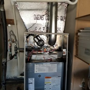 Rick's Heating and Air - Upflow furnace in garage- Installed into existing system. front panel removed. - Heating & Air Conditioning/HVAC Near Me Rick's Heating and Air - Upflow furnace in garage- Installed into existing system. front panel removed. - Heating & Air Conditioning/HVAC Near Me