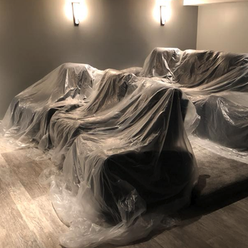 Custom Concepts - a couch covered in plastic - General Contractors Near Me - Bolton, Massachusetts Custom Concepts - a couch covered in plastic - General Contractors Near Me - Bolton, Massachusetts
