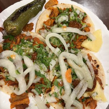 Juquilita Tacos - Tacos del al pastor with onion and cilantro - Tacos Near Me - Santa Ana, California Juquilita Tacos - Tacos del al pastor with onion and cilantro - Tacos Near Me - Santa Ana, California