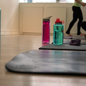 Pure Yoga - It's hot, bring water but there's a water cooler there with cups - Yoga Near Me - Petoskey, Michigan