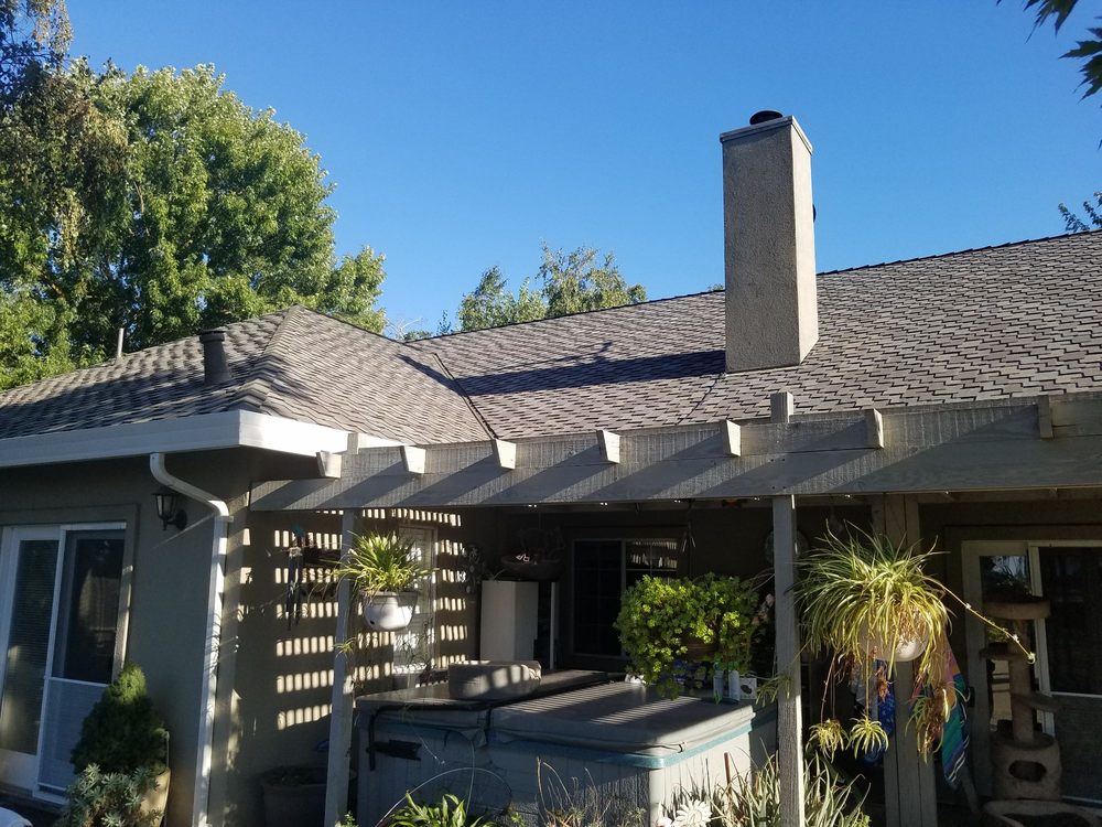 Slide of Green's Roofing