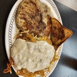 Waffle House - Pork chops with smothered covered hash browns