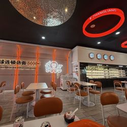 Zhangliang Malatang - Dinning area with view of items to choose from.