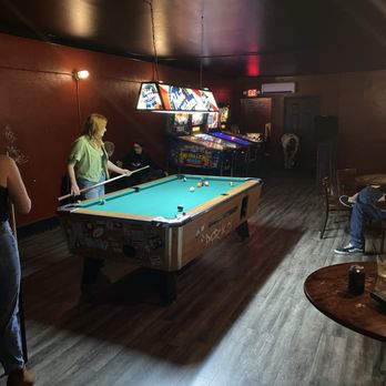 Slim's Downtown Distillery - Upstairs pool. - Dive Bars Near Me - Raleigh, North Carolina Slim's Downtown Distillery - Upstairs pool. - Dive Bars Near Me - Raleigh, North Carolina