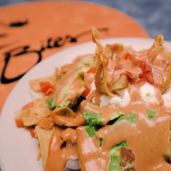 City Bites - a plate of nachos on a table - Sandwiches Near Me - Edmond, Oklahoma City Bites - a plate of nachos on a table - Sandwiches Near Me - Edmond, Oklahoma