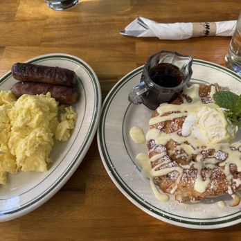 Madi - Orange Cinnamon Roll Pancakes with 2 eggs and sausage links - Breakfast & Brunch Near Me - San Diego, California Madi - Orange Cinnamon Roll Pancakes with 2 eggs and sausage links - Breakfast & Brunch Near Me - San Diego, California