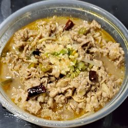 Nai Brother Chinese Sauerkraut Fish - F2 Golden Pickle Sliced Beef. Thin sliced beef in a sour and spicy broth. With cabbage, sliced potato, tofu skin, tofu, veg. Very good.