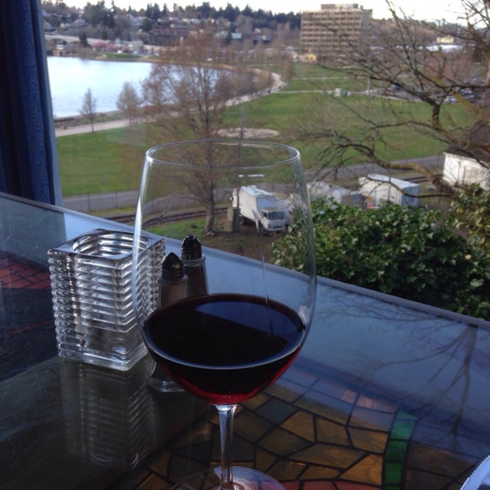 House Red wine of the day with a gorgeous view of the lake. Well worth the $5. (Plus tip) House Red wine of the day with a gorgeous view of the lake. Well worth the $5. (Plus tip)