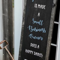 Sweetpea & The Rooster Antiques & More - Support local small business sign at entrance