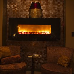 The Sanctuary Spa - Cedar Rapids - Fireplace in the relaxation room