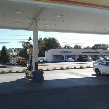 Shell - a gas station with cars parked in front of it - Gas Stations Near Me - North Providence, Rhode Island
