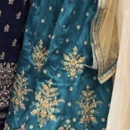 The bust of the shalwar was too small and the arms were a bit tight. After Lulu worked her magic it was a perfect fit.