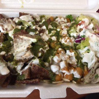Mazza Kitchen - Lamb over rice with chickpeas and side salad with White and Green sauce. Generous portion - Halal Near Me - Lorton, Virginia Mazza Kitchen - Lamb over rice with chickpeas and side salad with White and Green sauce. Generous portion - Halal Near Me - Lorton, Virginia