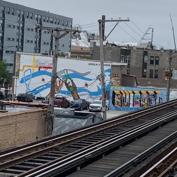 Mural Painting - Right near california train stop - Public Art Near Me - Chicago, Illinois