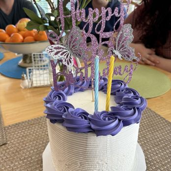 Patty's Cakes and Desserts - Semi custom cake with violet flowers. We provided the topper! - Bakeries Near Me - Fullerton, California Patty's Cakes and Desserts - Semi custom cake with violet flowers. We provided the topper! - Bakeries Near Me - Fullerton, California