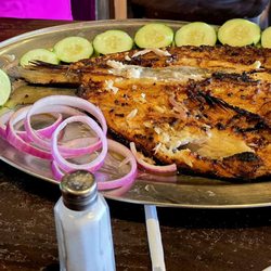 Coni Seafood - Pescado Zarandeado / 30 minutes* Grilled snook w/ salt & house sauce, served w/ caramelized onion & tortillas