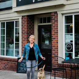 Exterior outside entrance of Tracycakes Bakery Cafe - Tracy and her pup- Reverend - Abbotsford, British Columbia Exterior outside entrance of Tracycakes Bakery Cafe - Tracy and her pup- Reverend - Abbotsford, British Columbia