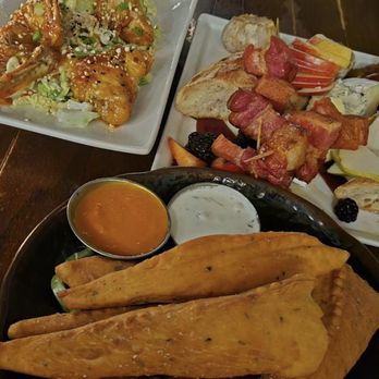 The Observatory - Cheese platter to the right. Wings to the left, and middle is I believe the Oregano bread. - New American Near Me - Portland, Oregon The Observatory - Cheese platter to the right. Wings to the left, and middle is I believe the Oregano bread. - New American Near Me - Portland, Oregon