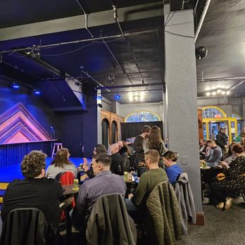 The Laughing Tap - Stage and seating area at the new Jefferson St. location - Comedy Clubs Near Me - Milwaukee, Wisconsin