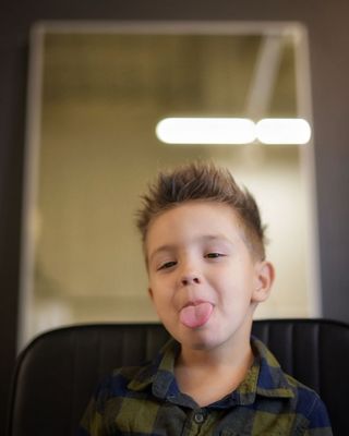 Kids Haircuts - Even young men should know what it means to have a barber they can trust. Give us a call or book on our website today.