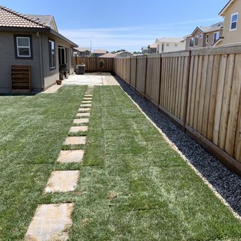 DV Landscape - Grass with stepping stones pathway - Landscaping Near Me DV Landscape - Grass with stepping stones pathway - Landscaping Near Me