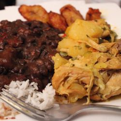 Elbita's Cocina - Stewed chicken with white rice, black beans and maduros