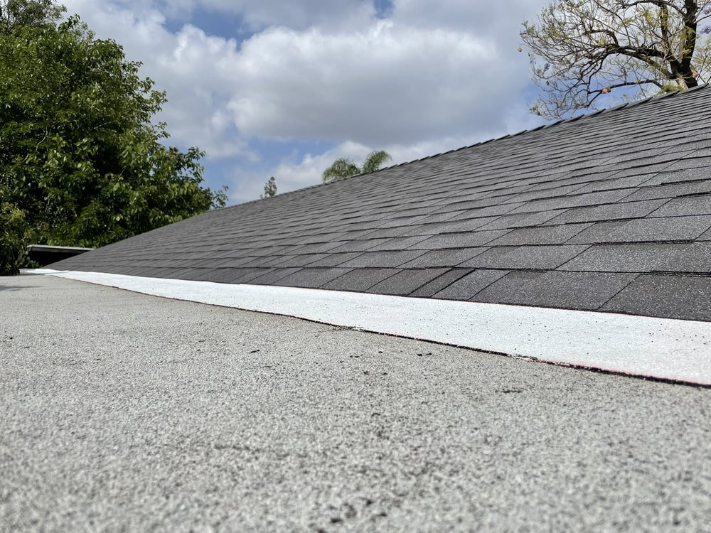 Slide of Mike's Roofing & Building