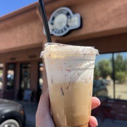 Perkin'Up Coffee House - Real pumpkin iced latte with pumpkin cold foam and a cookie crumb topping