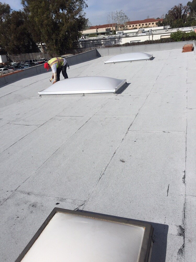 Slide of E & E Roofing