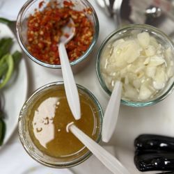 Ghien Mien Ga - Condiments , garlic peppers and ginger fish sauce