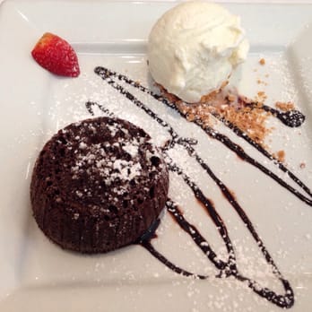 Basilico Ristorante - Chocolate molten cake with vanilla ice cream - Italian Near Me - Doral, Florida Basilico Ristorante - Chocolate molten cake with vanilla ice cream - Italian Near Me - Doral, Florida