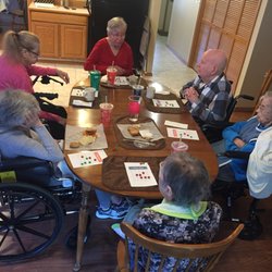 Brooks Blessings - West Olympia - Gathering around the table for bingo.