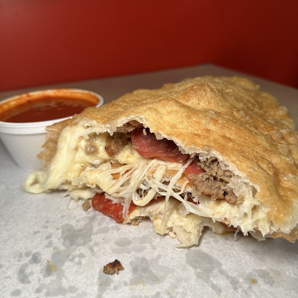 Angelina's Pizza - Two Topping Calzone - Pizza Near Me - Waterbury, Connecticut Angelina's Pizza - Two Topping Calzone - Pizza Near Me - Waterbury, Connecticut