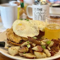 Market & Maple - Honey Butter Birdie $12.5 2 Eggs, Crispy Chicken Breast with Michigan Honey Butter served over French Toast. YUM!